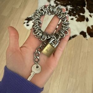 Silver chain link and gold padlock bracelet